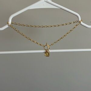 Gold Toned Pendant Necklace